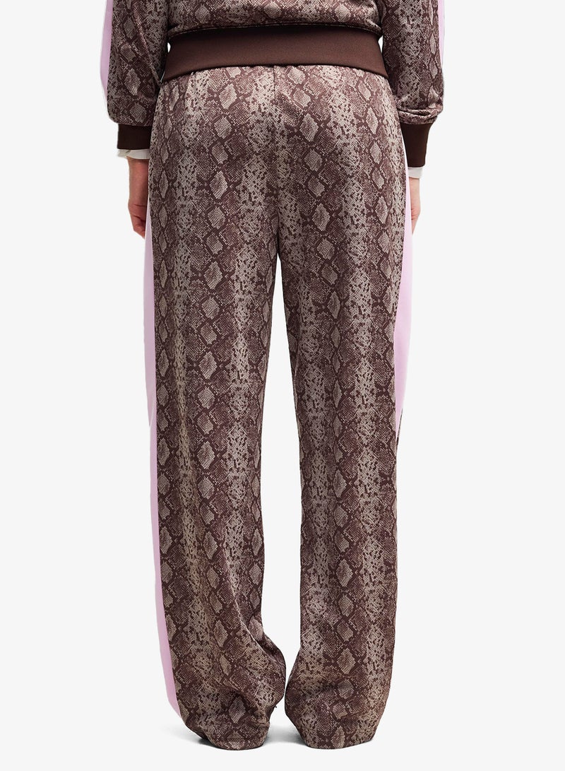 PUMA T7 Snake Aop Straight Sweatpants - Image 2