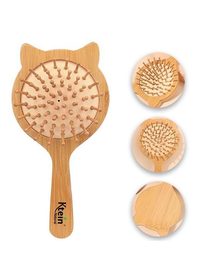 Ktein Ktein Air bag brush: This eco-friendly brush features bamboo bristles and a wooden handle, perfect for both men, women and kids. It's travel-friendly, gentle on hair, and ideal for everyday use. - Image 1