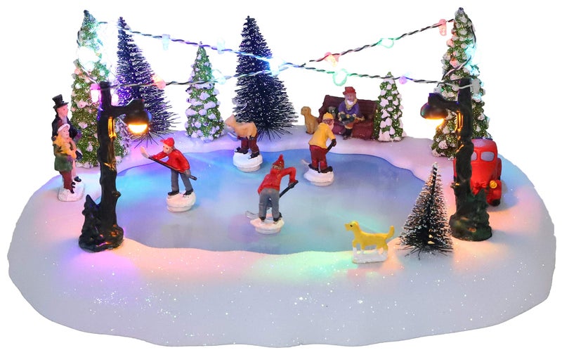 Christmas Concepts 300mm 12 Battery Operated Musical LED Animated Ice Rink Village Scene  Plays 8 Christmas Melodies