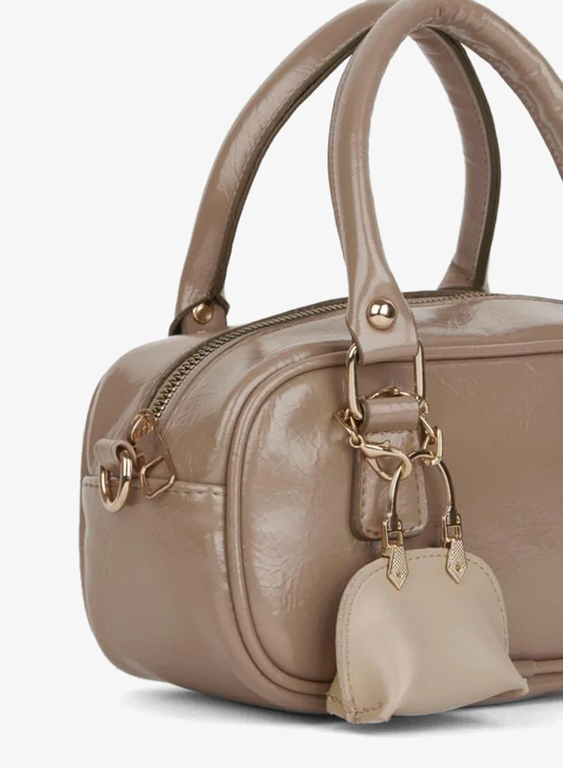 Women's Tulip Dark Violet Bag with Charm Detail, Rugged Faux Leather, Zipper Closure, Hand, Shoulder, and Crossbody Bag.