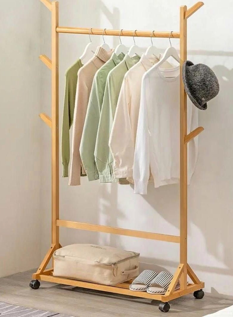 حامل ملابس خشبي لتعليق الملابس. مزود برف واحد، يتحمل وزنًا يصل إلى 35 كجم. الأبعاد: 100 سم × 145 سم × 37 سم. مصنوع من خشب الزان. - Image 1