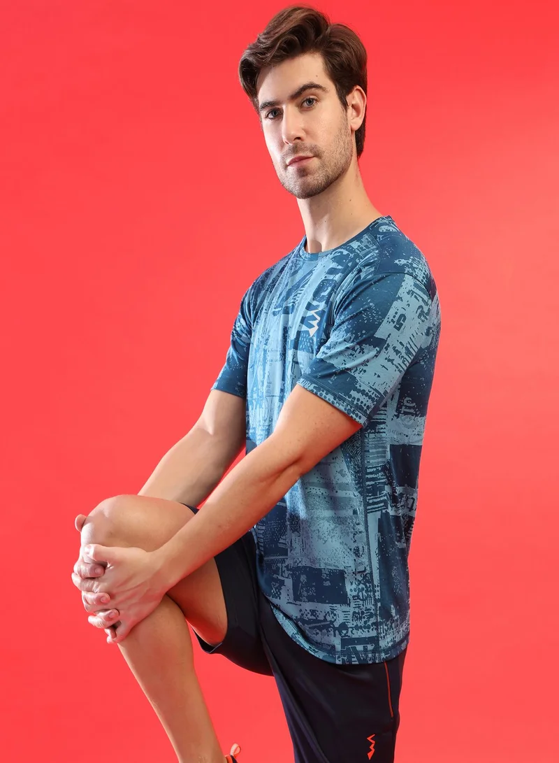 Campus Sutra Campus Sutra Men's Blue Printed Dri-Fit Short Sleeve Regular Fit Activewear T-Shirt For Casual Wear | Modern Clothing T-Shirt Crafted With Comfort Fit And High-Performance For Everyday Wear