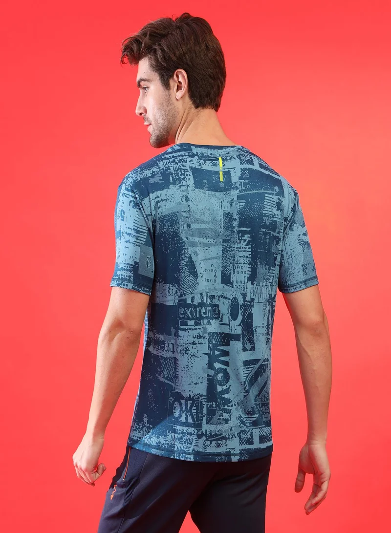 Campus Sutra Campus Sutra Men's Blue Printed Dri-Fit Short Sleeve Regular Fit Activewear T-Shirt For Casual Wear | Modern Clothing T-Shirt Crafted With Comfort Fit And High-Performance For Everyday Wear