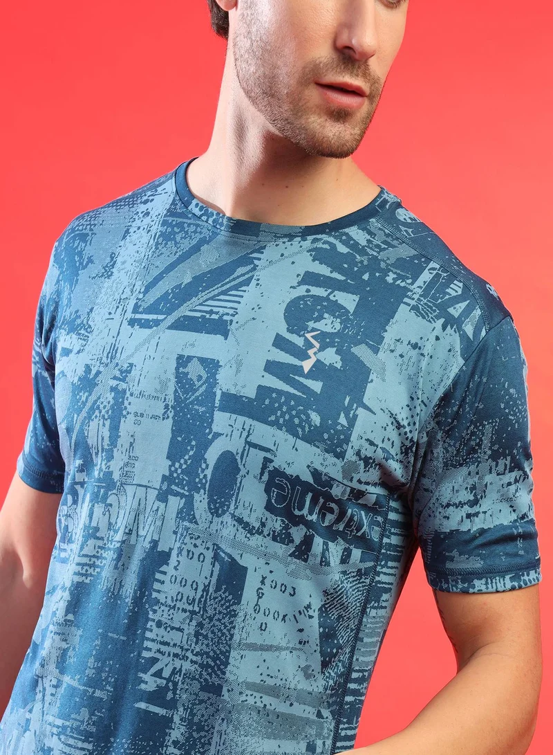 Campus Sutra Campus Sutra Men's Blue Printed Dri-Fit Short Sleeve Regular Fit Activewear T-Shirt For Casual Wear | Modern Clothing T-Shirt Crafted With Comfort Fit And High-Performance For Everyday Wear