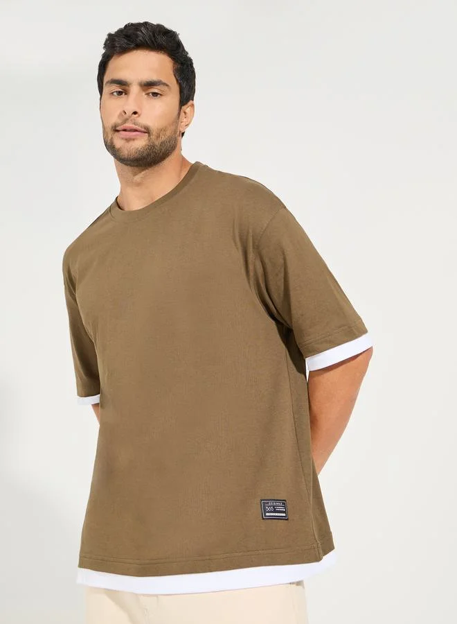Styli Contrast Panel Oversized T-Shirt with Badge Detail