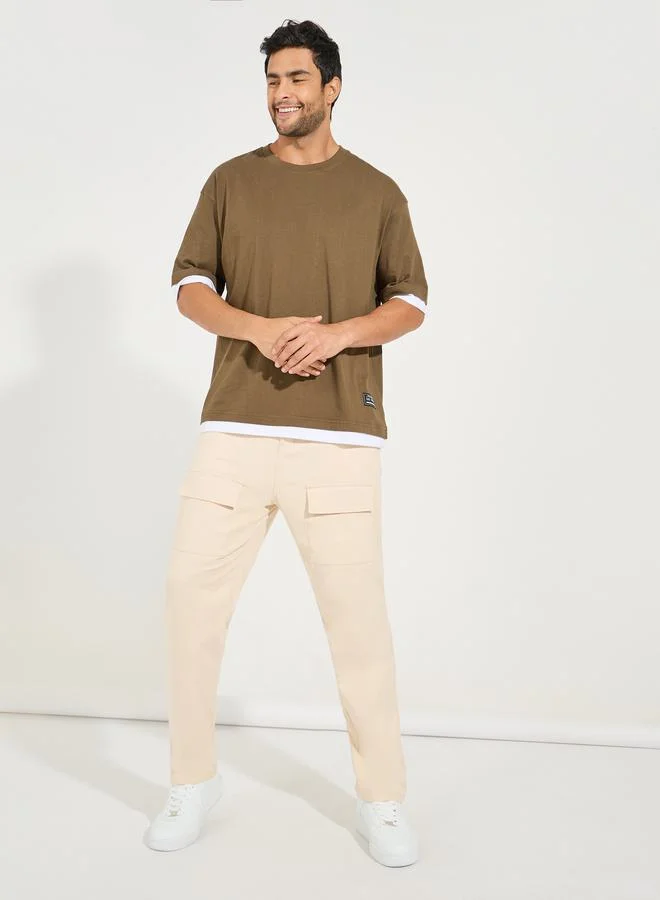 Styli Contrast Panel Oversized T-Shirt with Badge Detail