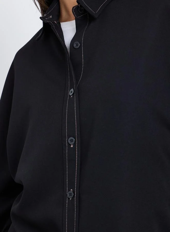 ستايلي بلوزة واسعة بشريط أزرار