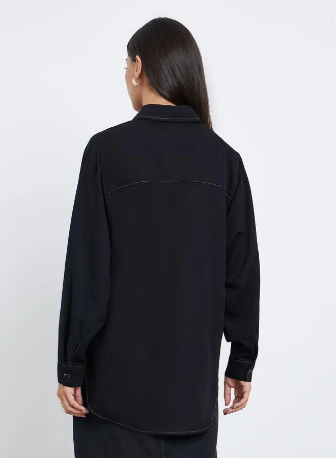 ستايلي بلوزة واسعة بشريط أزرار