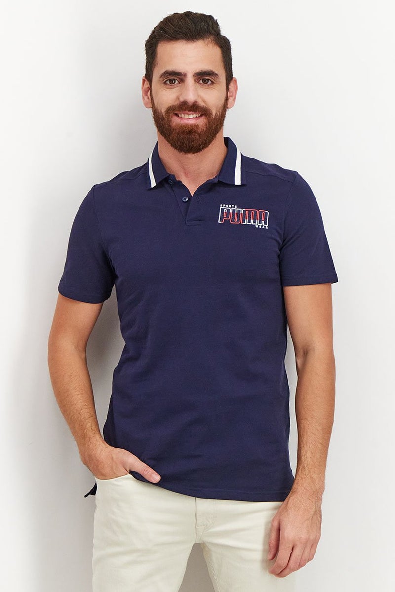 PUMA قميص بولو قصير الأكمام للرجال بتصميم عادي مع شعار، أزرق داكن - Image 1