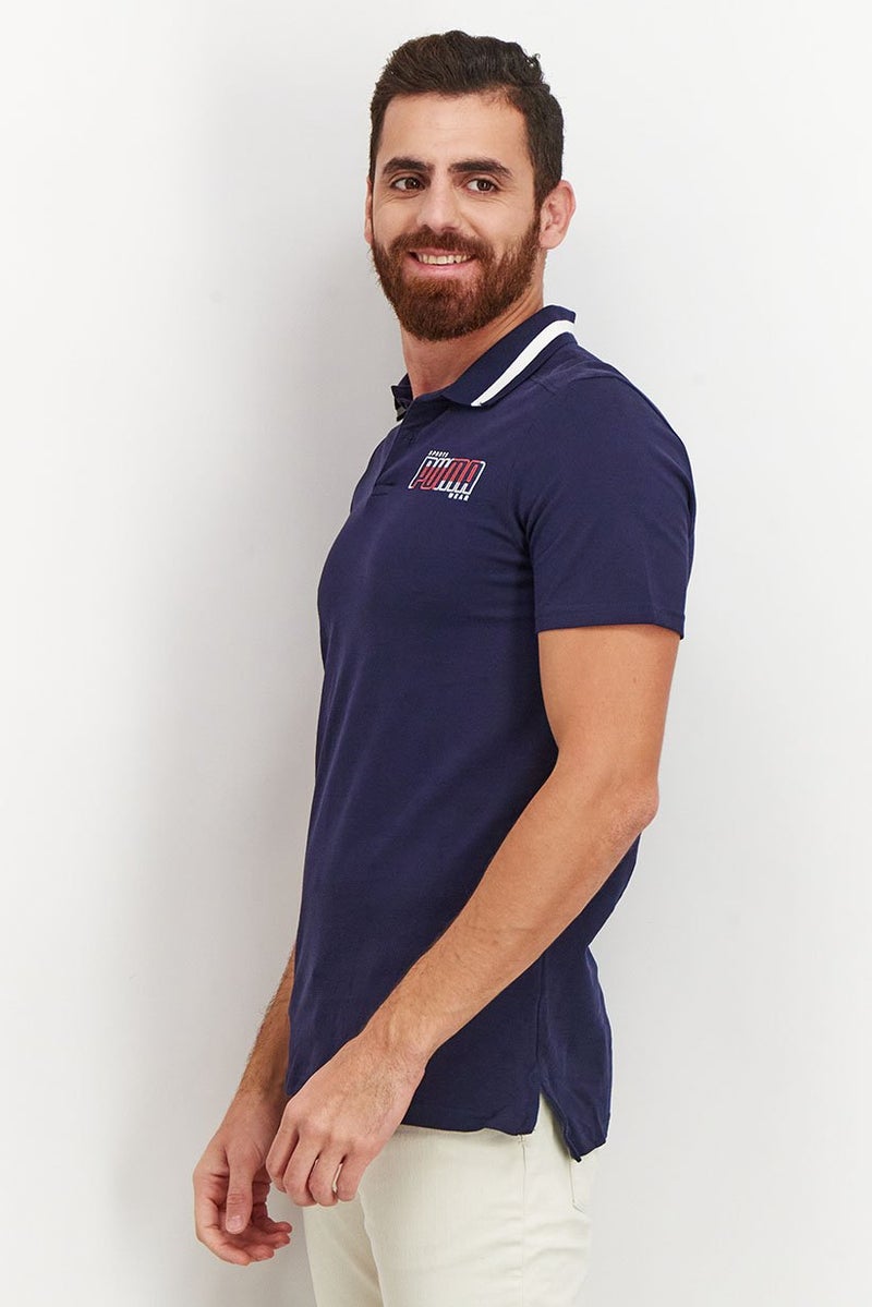 PUMA قميص بولو قصير الأكمام للرجال بتصميم عادي مع شعار، أزرق داكن - Image 3