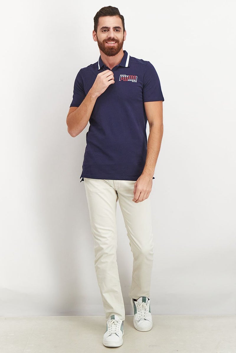 PUMA قميص بولو قصير الأكمام للرجال بتصميم عادي مع شعار، أزرق داكن - Image 2