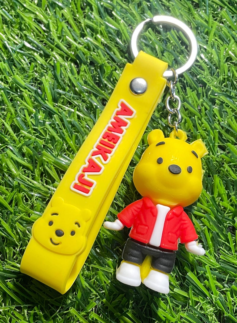 Unique cartoon keychain, cute accessory, anime keyring featuring yellow bear character with strap that fits over the car, wallet, and bag. lovely and creative gift. - Image 1