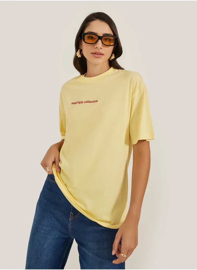 ستايلي Embroidered Slogan Round Neck Oversized T-Shirt