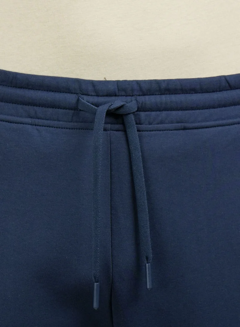 GIORDANO  Men's G-Motion Slim Tapered Joggers - Comfortable & Stylish for Men | Best Price UAE