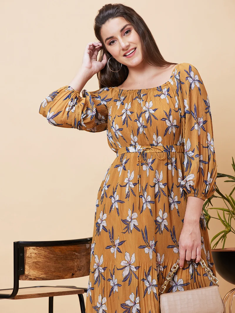 جلو باص فستان نسائي أصفر خردلي وأبيض بطبعات زهور، ثنيات أكورديون، أكمام منفوشة، قصة -