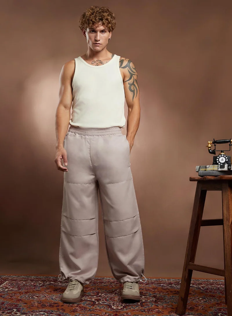 CAHOOT  Men's Saltbox Beige Panelled Parachute Trousers for Men | Best Price UAE