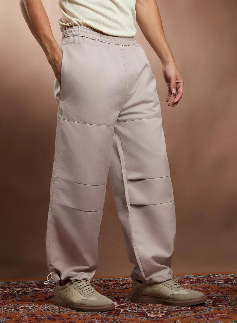 CAHOOT  Men's Saltbox Beige Panelled Parachute Trousers for Men | Best Price UAE