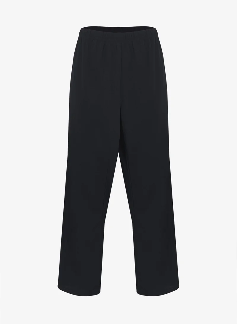 خزانة طقم بكسرات مخفية (بنطال + قميص تونيك)