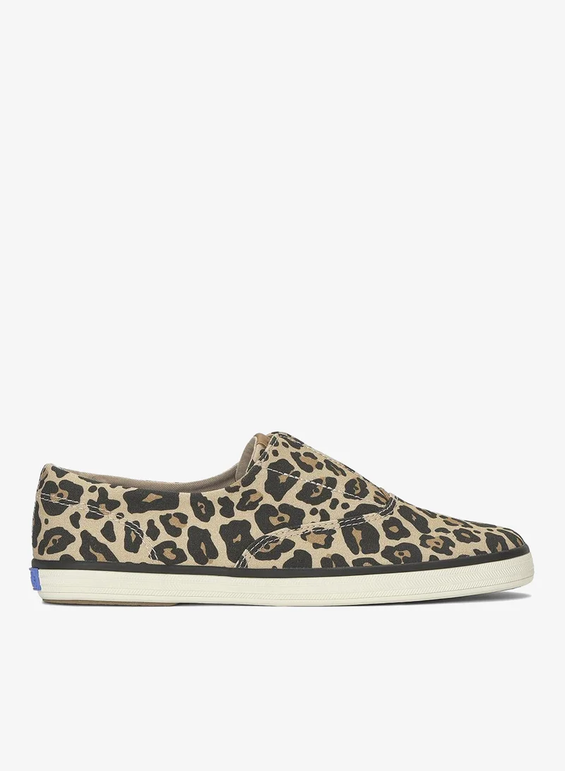 كيدز Keds Women's Champion Round Toe Slip On Canvas Casual Sneaker Tan