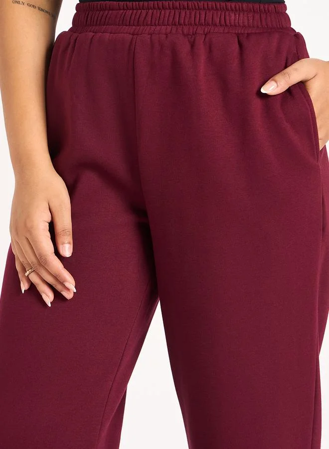 Femmella  Burgundy Straight Fit Fleece Trackpants for Women | Best Price UAE