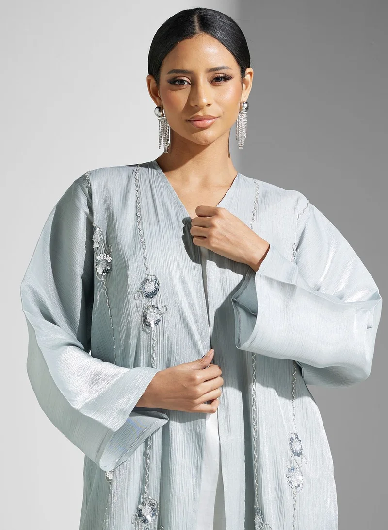 Khizana Shimmer Abaya With Embellishment With Sheila