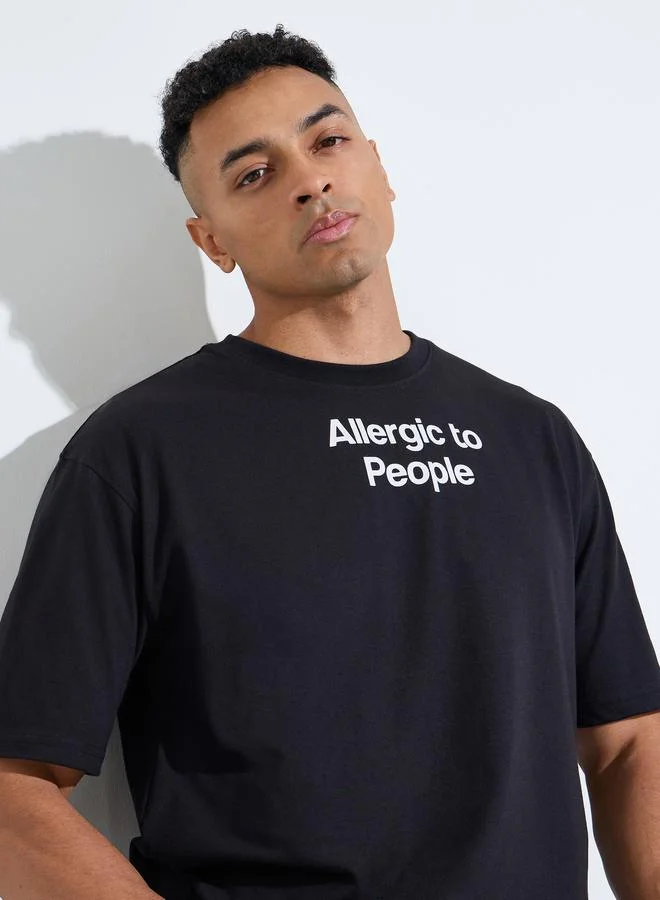 Styli Black Slogan print Crew neck Oversized T-Shirt