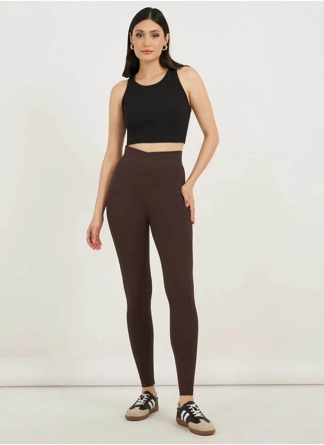 ستايلي Criss-Cross Waistband Ankle Length Leggings