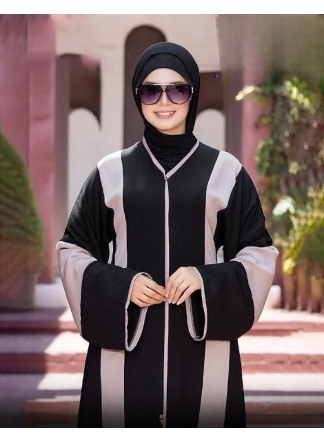 Luxurious Gulf-style women's abaya — a design inspired by Saudi, Emirati, and Kuwaiti abayas, made from soft and flowing Turkish silk crepe fabric, suitable for occasions, outings, and evenings out, offering a chic and distinctive look. Code 4052 - Image 4