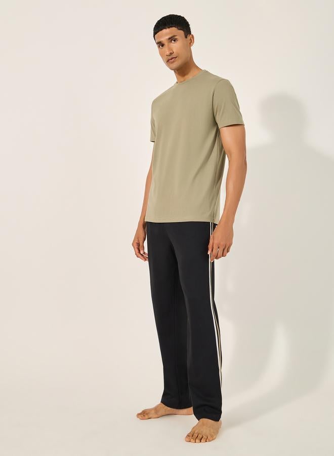 Styli Solid Round Neck T-Shirt and Striped Pyjama Set - Image 1