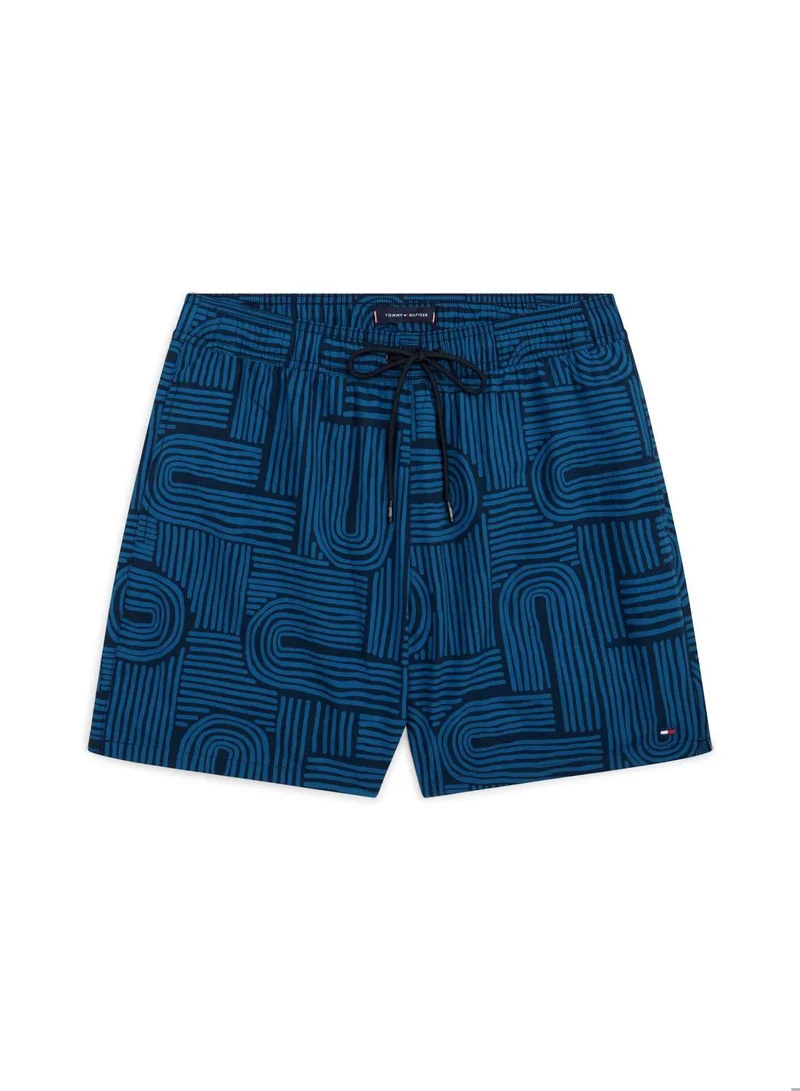 TOMMY HILFIGER Abstract Mosaic Desert Sky Print Mid Length Swim Shorts for Men | Best Price UAE