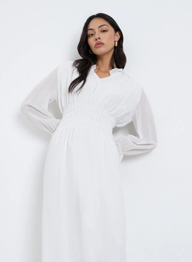 ستايلي فستان ميدي بتفاصيل بارزة الملمس