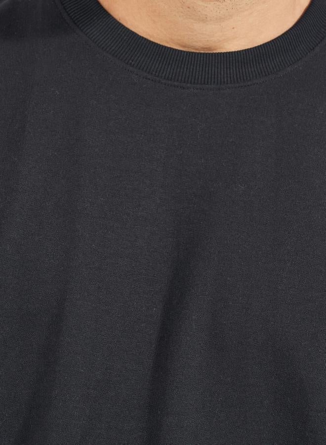 ستايلي تيشيرت تيري بقصة بوكسي وأكمام ملفوفة - Image 3