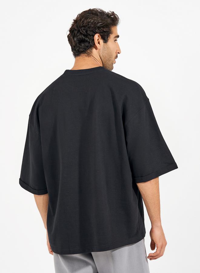 ستايلي تيشيرت تيري بقصة بوكسي وأكمام ملفوفة - Image 4