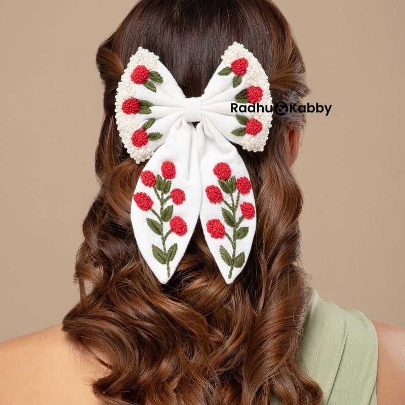 Radhu & Kabby Radhu Kabby Handmade Embroidered Hair Bow Clip for Girls Women Elegant White Bow with Red Floral Detailing Soft Grip AntiHair Fall Lightweight Suitable for All Hair Types 1 Pc - Image 2