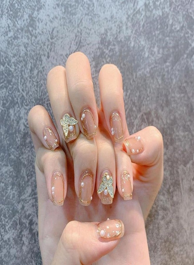 KRESHU 24Pcs Gold Butterfly & Pearl Short Fake Nails Champange Color INS Style Manicure Detachable Fingernails for Women, Girls Wedding Gifts Daily Decoration Press on Nail Reusable set (1-Set) - Image 1