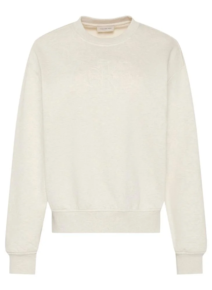 Calvin Klein Jeans Vanilla Heather Embossed Logo Terry Crew Neck Sweatshirt for Women | Best Price UAE