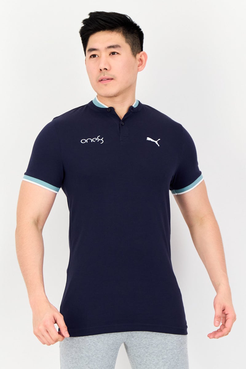 Puma x One8 Men Slim Fit Short Sleeve Outdoor Polo Shirt, Navy - Image 1