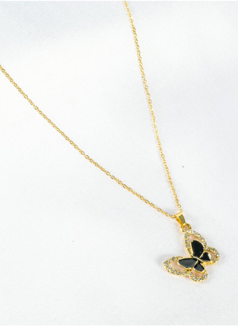 The Black Pearl Accessories - Stainless Steel Neckalce Gold with a Zirconic Black Butterfly Pendant - Image 1