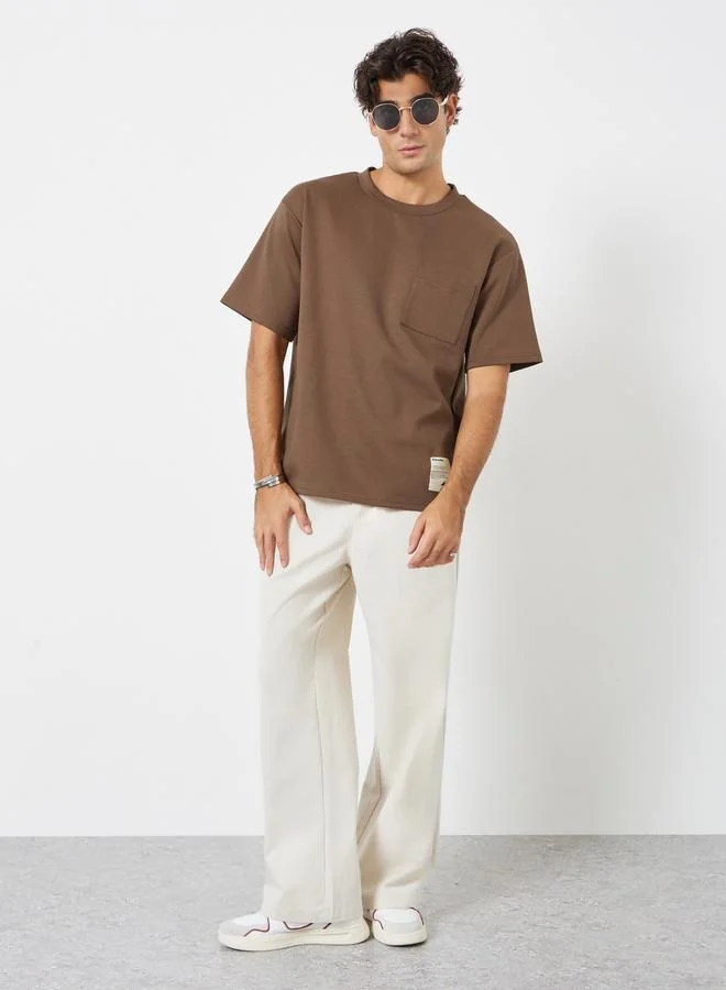 Styli Men Oversized Compact Stretch Heavy Jersey T-Shirt with Badge