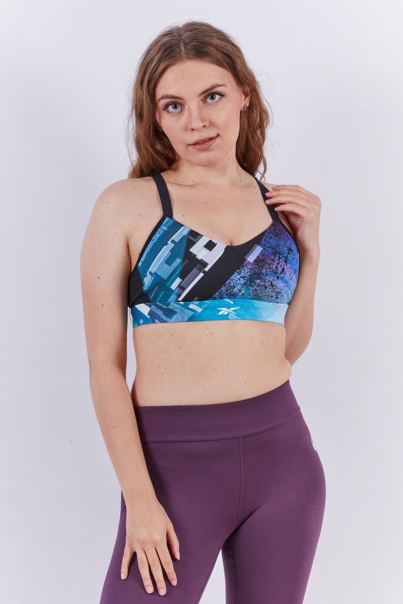 Reebok حمالة صدر رياضية للنساء مبطنة قليلاً بطبعة شاملة، متعددة الألوان - Image 1