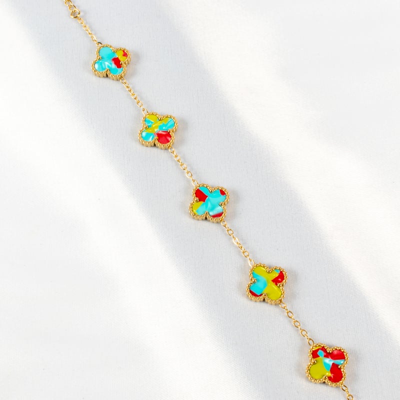 ذا بلاك بيرل اكسسوريز أنسيال أستانليس ستيل ذهبي مع شكل زهرة البرسيم بألوان خلابة - Image 2