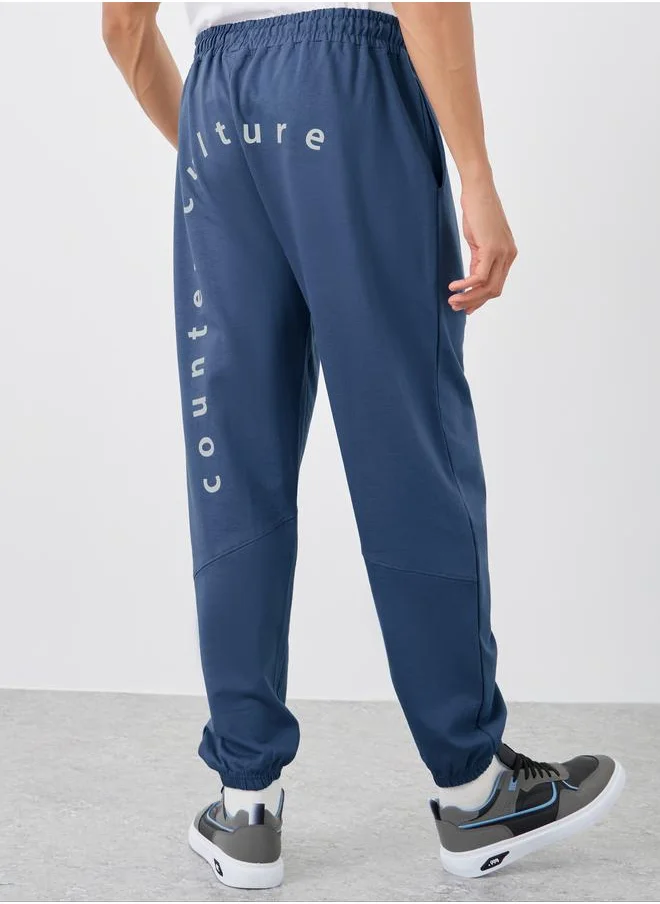 ستايلي Styli Slogan Print Oversize Joggers with Drawstring