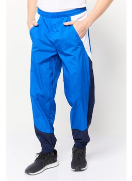 Reebok Men Sportswear Fit Brand Logo Training Track Pants, Blue  - Image 1