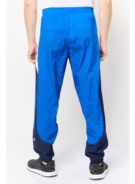 Reebok Men Sportswear Fit Brand Logo Training Track Pants, Blue  - Image 4