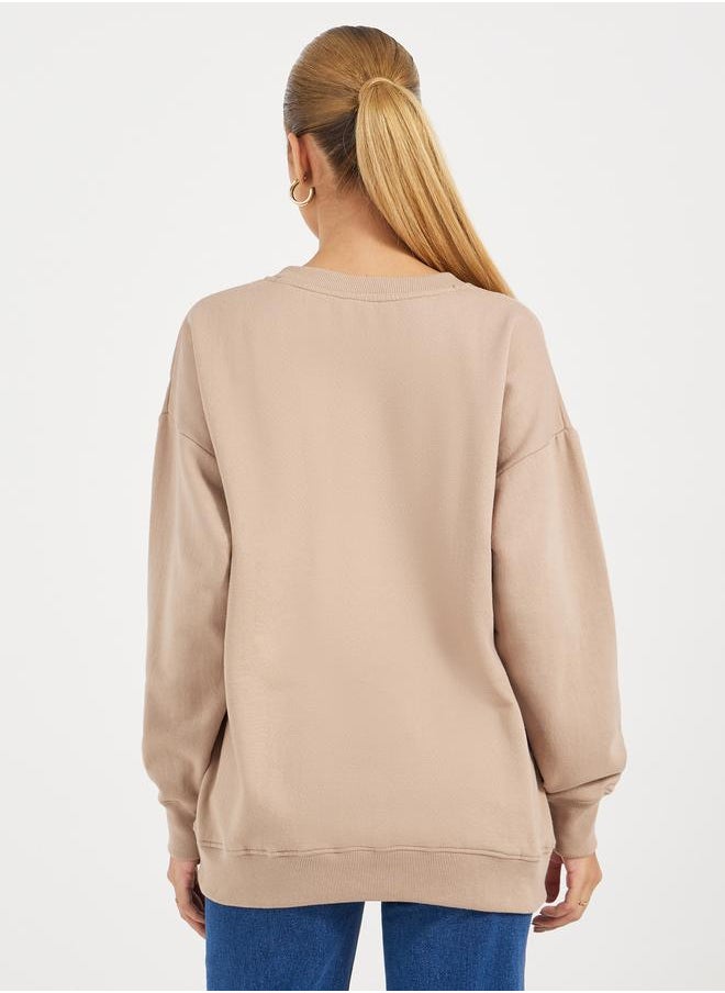 Styli - Oversized Longline Slogan Sweatshirt - Image 1