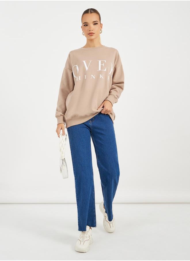 Styli - Oversized Longline Slogan Sweatshirt - Image 1