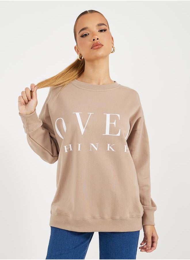 Styli - Oversized Longline Slogan Sweatshirt - Image 1