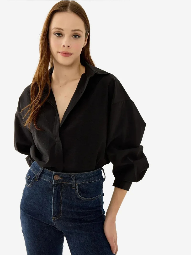 زوبعة قميص أساسي واسع