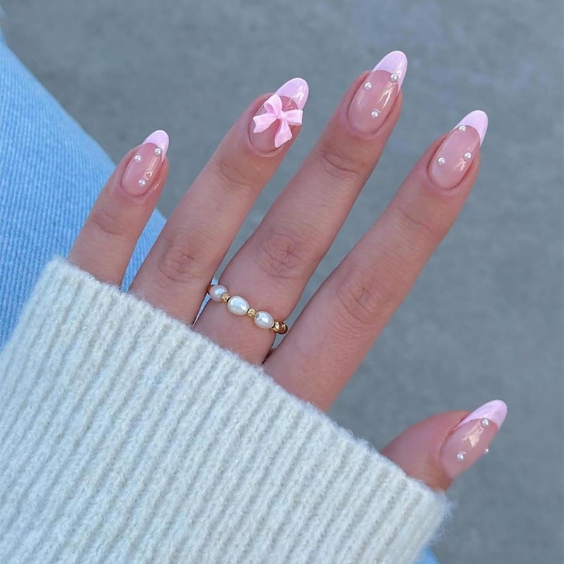 GRITOSE 24Pcs Pink French Tip Press on Nails Short Almond Fake Nails with 3D Bow Pearl Design Pink Full Cover False Nails Reusable Almond Nails Press ons Artificial Glue on Nail Cute Bow Nail for Women Girls - Image 1