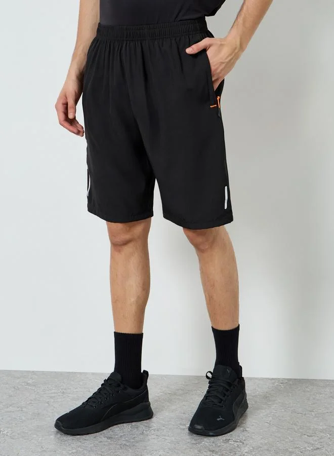 Styli Active  Men Reflector Print Training Shorts with Zipper Pocket for Men | Best Price UAE